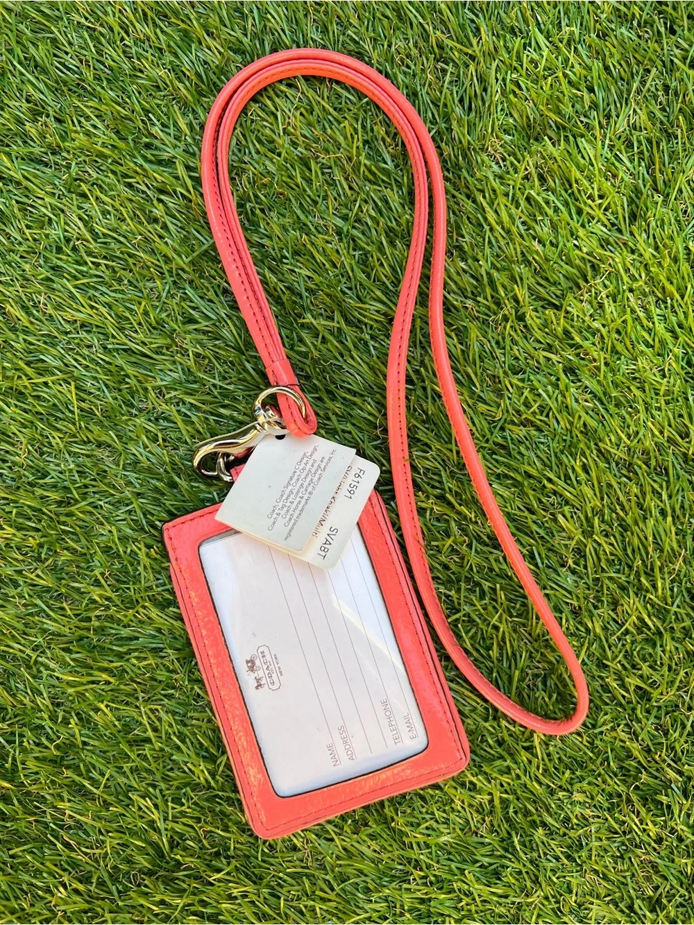 COACH- Signature SEASHELL PINK/BEIGE Lanyard ID # F61591